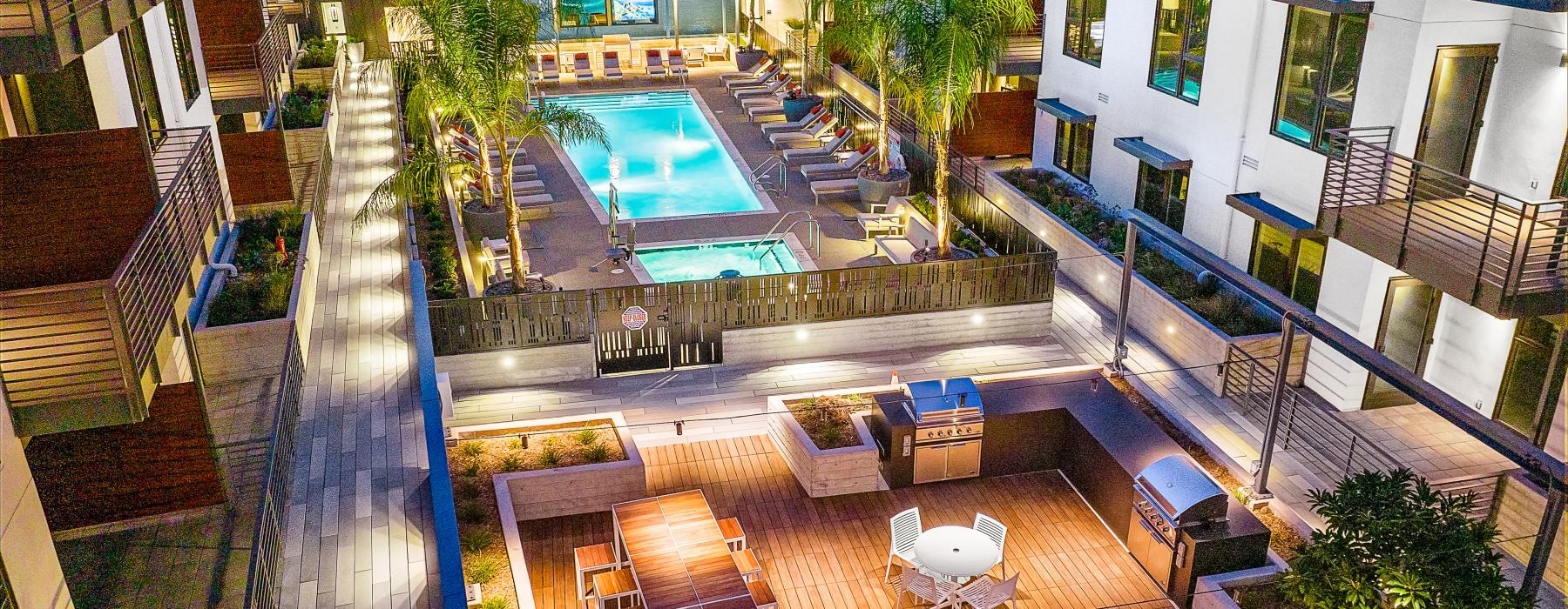 a courtyard with tables and chairs