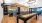 a room with a table and chairs