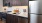 a kitchen with black appliances