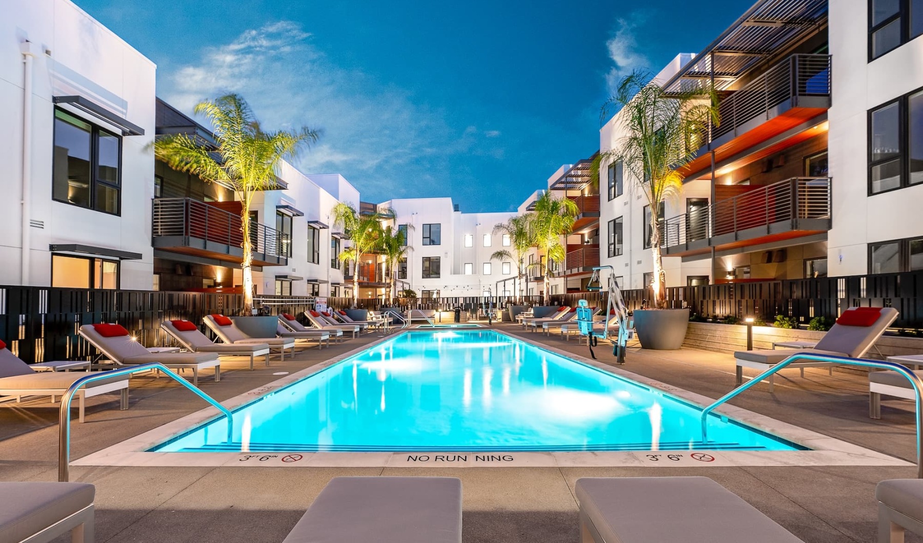 pool with modern stonework and reclining seats