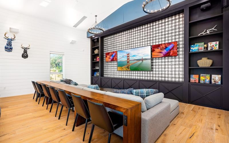 a room with a table and chairs